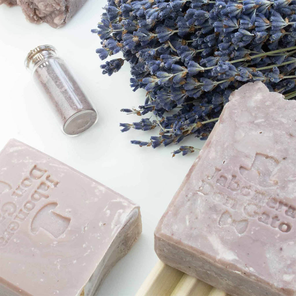 Don Gato Natural Soap Collection cover featuring handcrafted soap bars with botanical ingredients, dried lavender flowers, and a clean white background.