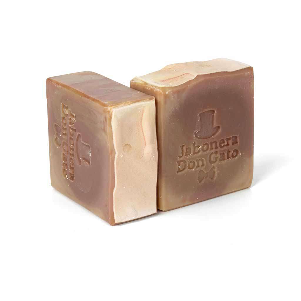 Two Coconut Sandalwood artisan soap bars, featuring a subtle light brown color, neatly arranged on a stark white background, accentuating the unique craftsmanship and inviting aroma of these natural, handmade soaps.