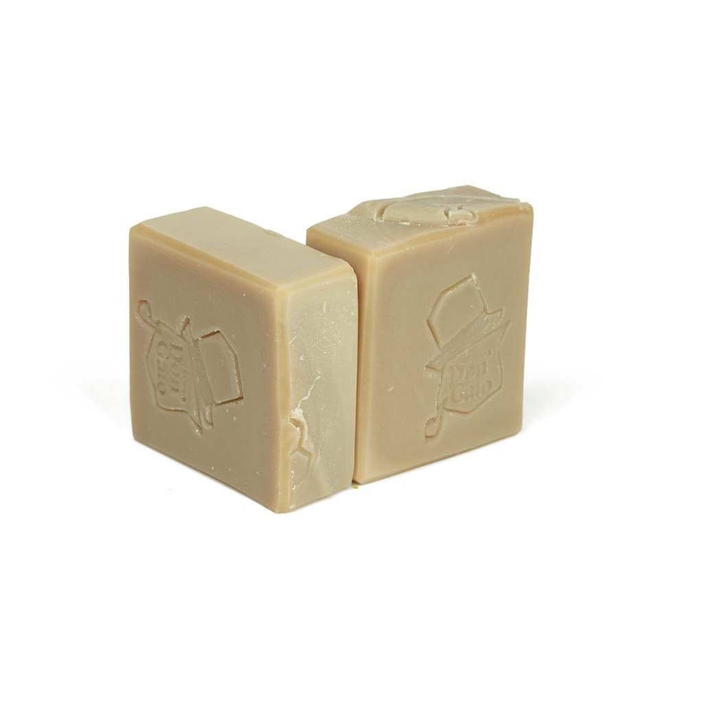 Honey artisan soap by Jabonera Don Gato from the Bestsellers collection with smooth golden beige tone and brand logo emboss on white background.
