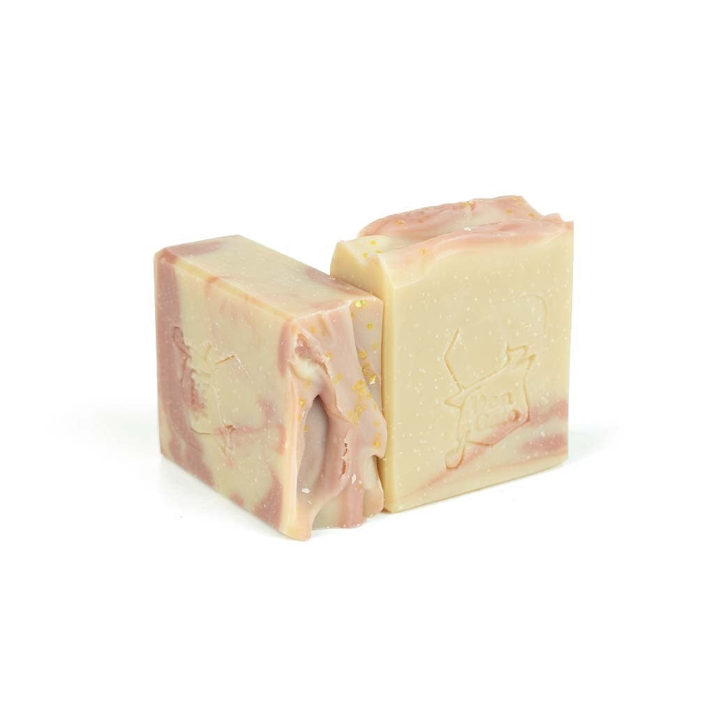 Palo Santo artisan soap by Jabonera Don Gato from the Bestsellers collection with beige and rose swirls on white background.
