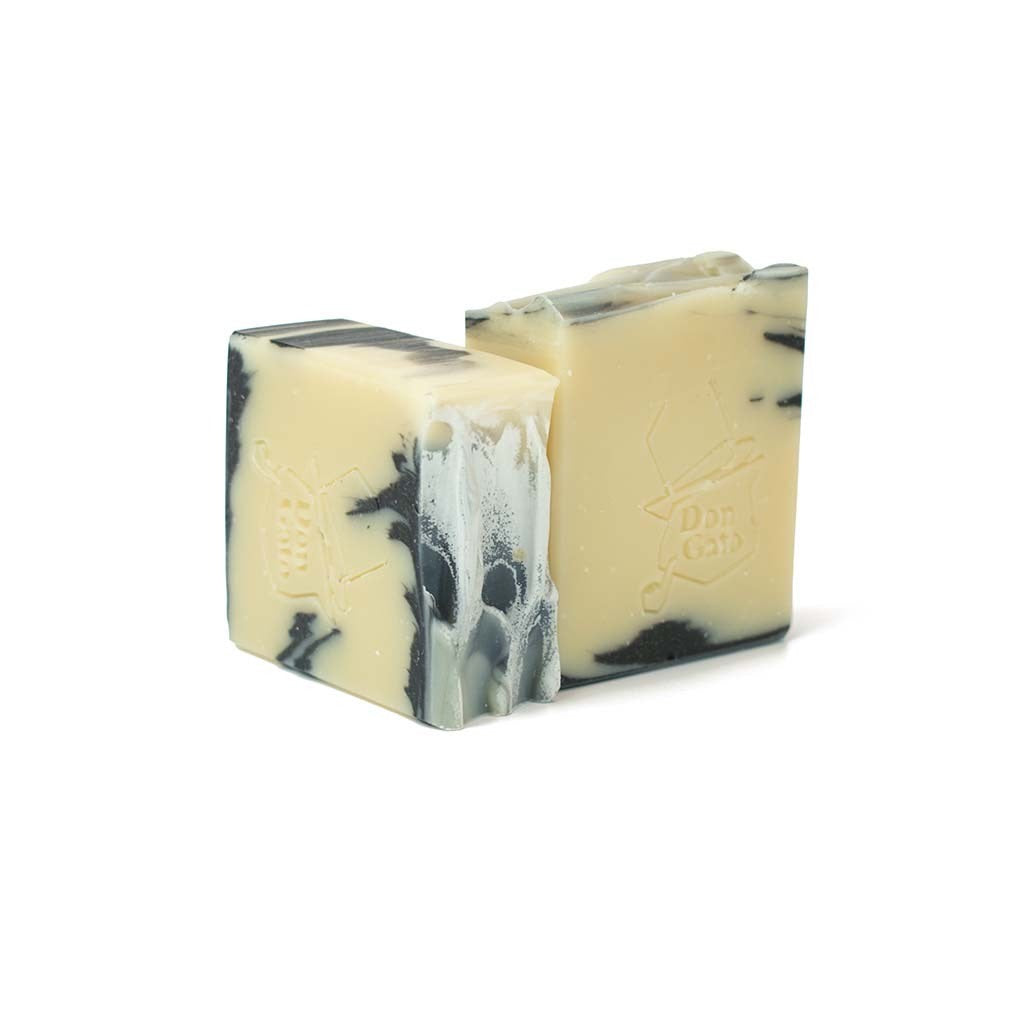 Don Gato natural soap bar with black and cream swirls, peppermint and anise scent.