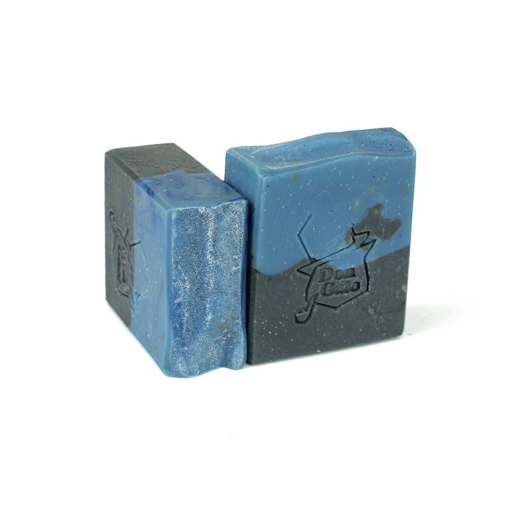 The Doctor Artisan Soap bar in blue and black, citrus and woods masculine scent.